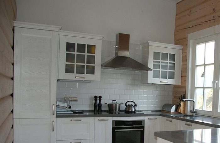 White subway tile with white grout on the backsplash