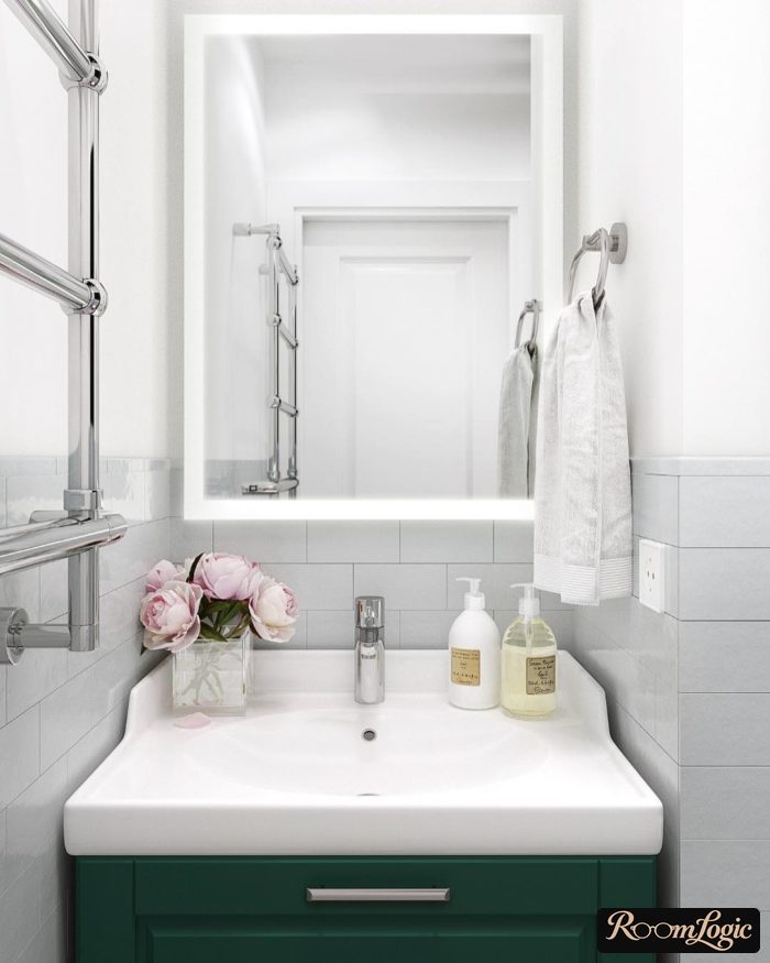 White tile brick halfway up the wall in the bathroom
