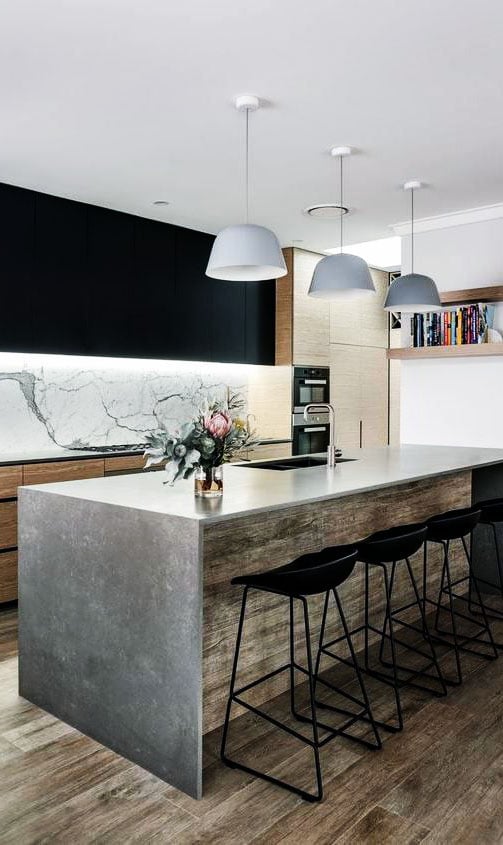 wide concrete bar counter on the kitchen