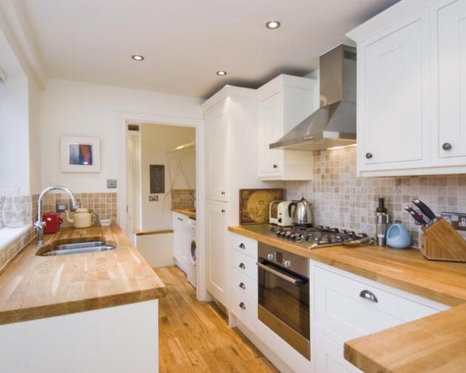 wood-look countertop on white kitchen
