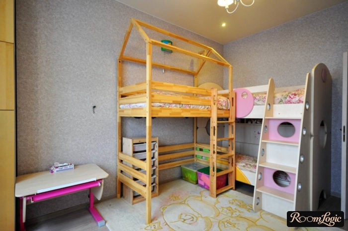 wooden loft bed with a play zone below