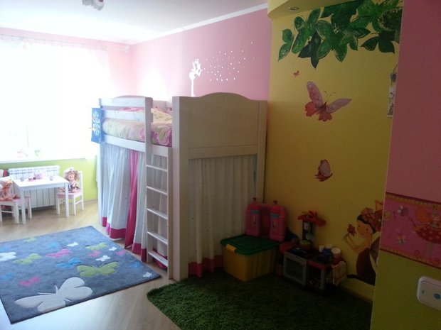 yellow and pink designed kids' room for girl
