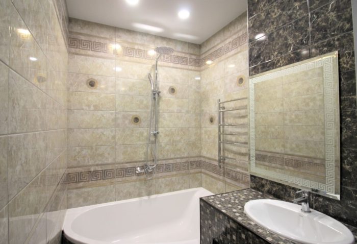 yellow marble-look tile in the bathroom